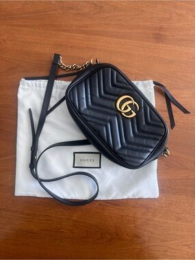 Beautiful Gucci GG Marmont Camera Bag in black matelassé chevron leather.